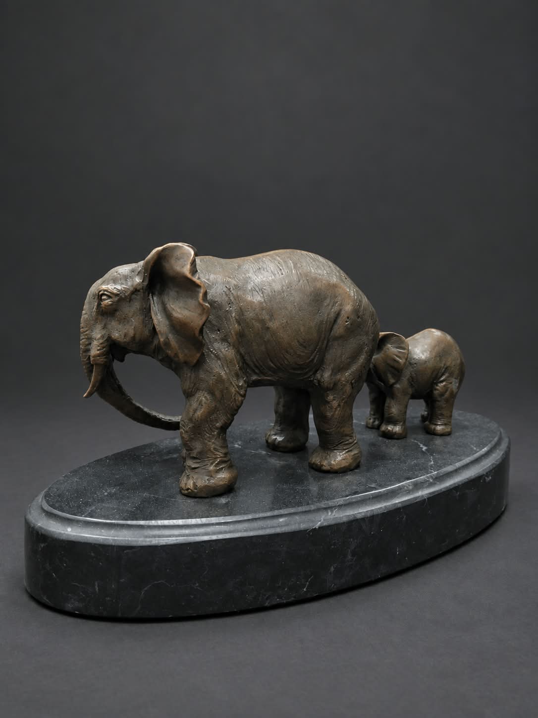 Bronze sculpture of an elephant and calf
